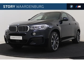 BMW X6 xDrive40d High Executive M Sport Automaat / Schuif-Kanteldak / Trekhaak / Sportstoelen / Adaptief M onderstel / Soft Close / Adaptieve LED / Stoelverwarming / Head-Up / Harman Kardon