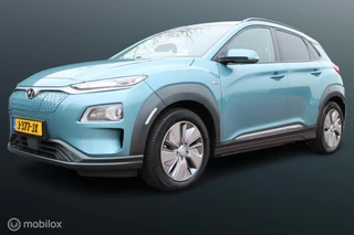 Hyundai Kona EV Premium 64 kWh, leer, Stoel-stuurverwarming, Head-up Display, 3 fasen, Donker glas, App connect + Navi, Pdc + camera