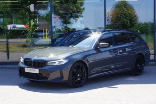 BMW 3 Serie Touring 330e xDrive 293 PK M-Sport PHEV, Dravit Grau, Trekhaak, Memory, Head-Up
