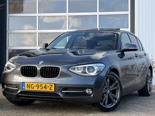 BMW 1 Serie 116i High Executive 136pk | Elektrisch glazen schuif-/kanteldak | Bi-xenon koplampen | Bluetooth | Cruise control | Lederen bekleding | Navigatiesysteem full map + hard disk | Voorstoelen verwarmd | Dealer onderhouden!