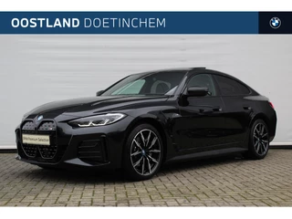 BMW i4 eDrive40 High Executive M Sport / Schuif-kanteldak / Achteruitrijcamera / Stoelverwarming / Live Cockpit Professional