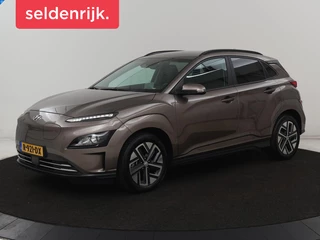 Hoofdafbeelding Hyundai Kona Hyundai Kona EV Fashion 64 kWh | SOH 100% | 3 Fase | Head-Up |  Warmtepomp | Adaptive cruise | Camera | Carplay | Keyless | Full LED | Navigatie | Climate control