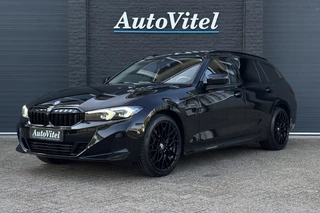 BMW 3 Serie Touring 330e xDrive | Panodak | Harman Kardon | Camera | Stoel + Stuurverwarming | Facelift | 19" Breedset