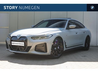 BMW i4 eDrive40 High Executive M Sport / Schuif-kanteldak / Achteruitrijcamera / Active Cruise Control / Live Cockpit Professional / Stoelverwarming