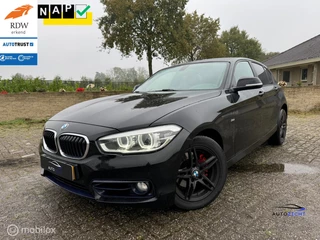 Hoofdafbeelding BMW 1 Serie BMW 1-Serie 120i | Zwarte hemel | Cruise | M Stuur | 220PK!