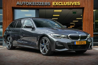 BMW 3-serie Touring 330e High Executive M Sport Panodak Harman Kardon HUD Leer Alcantara