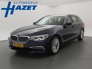 Hoofdafbeelding BMW 5 Serie BMW 5-serie Touring 520i H.E. 184 PK AUT. LUXURY LINE + HEAD-UP / STANDKACHEL / LED / COMFORTZETELS