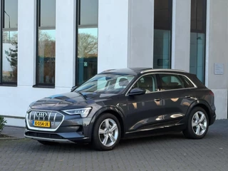 Hoofdafbeelding Audi e-tron Audi E-tron 50 quattro Business edition Plus 71 kWh, panoramadak, leder, stoelverwarming, camera, NL auto met nap