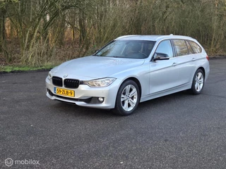 BMW 3-serie Touring 320i High Executive