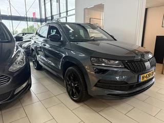 Škoda Karoq BWJ 2020 1.5 TSI 150 PK ACT Sportline Business AUTOMAAT | TREKHAAK | KEYLESS | CAMERA | PANORAMADAK | APPLE CARPLAY | ANDROID AUTO | NAVI | CLIMA | CRUISE | LMV | PDC