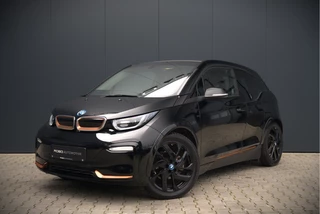 Hoofdafbeelding BMW i3 BMW i3 S 120Ah 42 kWh RoadStyle Edition | Harman Kardon | Leer | Warmtepomp | Cruise Control | Navigatie Pro | Carbon Dak | Keyless | Parkeersensoren | Stoelverwarming | Dealer Onderhouden | NAP |