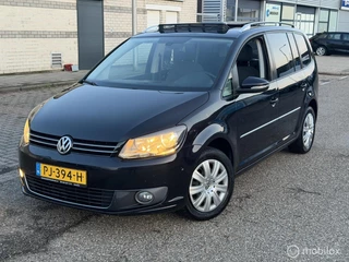 Volkswagen Touran 1.6 TDI 7 persoon.  Panoramadak