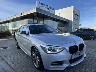 BMW 1 Serie M135i xDrive High Executive M-Performance int. en uitlaat | Carbon | Memory | Leer | Camera |