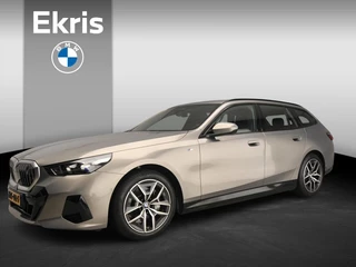 Hoofdafbeelding BMW i5 BMW i5 Touring xDrive40 | M-Sportpakket | LED | Navigatie | Active cruise | Sportstoelen | Elektr. zetels | Keyles go | DAB | Harman-kardon sound | Alu 19 inch