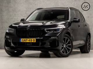 Hoofdafbeelding BMW X5 BMW X5 xDrive45e M Sport High Executive 395Pk Automaat (PANORAMADAK, APPLE CARPLAY, LUCHTVERING, HEAD-UP DISPLAY, HARMAN/KARDON, LASER KOPLAMPEN, COMFORTSTOELEN, LIVE COCKPIT PRO, ADAPTIVE CRUISE, NIEUWSTAAT)