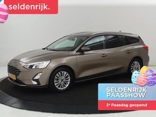 Ford Focus 1.0 EcoBoost Titanium | Stoelverwarming |  Trekhaak | Adaptive cruise | Carplay | Keyless | Navigatie | Parkeerhulp | Stuurverwarming | Climate control | Getint glas