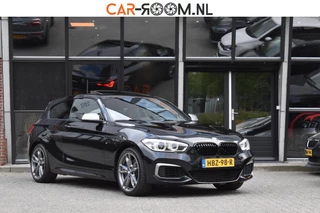 Hoofdafbeelding BMW 1 Serie BMW 1-serie M140i xDrive High Executive Pano Camera H/K Leder Elekstoel