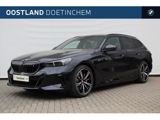 Hoofdafbeelding BMW i5 BMW i5 Touring eDrive40 M Sport / Panoramadak / Trekhaak / Bowers & Wilkins / M Multifunctionele Stoelen / Parking Assistant Professional / Stoelventilatie