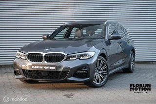 BMW 3-serie Touring 330e High Executive | M Pakket | Pano | HUD | ACC | Stoelverw. | LED | Flippers | NL Auto | Helder glas