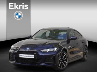BMW i4 eDrive35 M Sportpakket | Comfort Pack | Stuurwielrand verwarmd | Trekhaak met elektrisch wegklapbare kogel | Elektrisch bediend glazen schuif-/kanteldak | Extra getint glas
