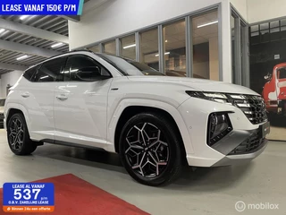 Hoofdafbeelding Hyundai Tucson Hyundai Tucson 1.6 T-GDI PHEV N Line 4WD Panorama Apple Carplay PDC