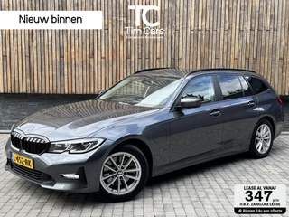 BMW 3-serie Touring 320e High Executive Automaat | Trekhaak elektrisch | Navigatiesysteem | Laser LED | Draadloze telefoonlader | Apple CarPlay | Getint glas | Metallic lak | Sportleer | Parkeersensoren voor en achter