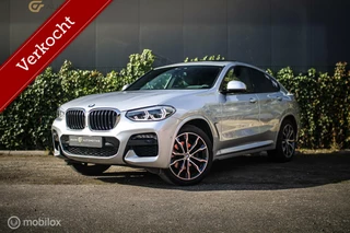 Hoofdafbeelding BMW X4 BMW X4 xDrive20i High | Pano | M pakket | stoelventil|