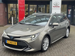 Hoofdafbeelding Toyota Corolla Touring Sports Toyota Corolla Touring Sports 2.0 HYBRID BUSINESS INTRO TREKHAAK STOELVERW HEAD-UP PARK-SENSOREN NAVI CLIMA AD-CRUISE LM-VELGEN BLUETOOTH NL-AUTO 1E-EIG