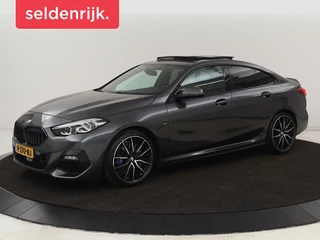 Hoofdafbeelding BMW 2 Serie BMW 2-serie 218i M Sport | Panoramadak | Sportstoelen |  Leder | Camera | Carplay | Live Cockpit | Stoelverwarming | Getint glas | Navigatie | Climate control | Full LED