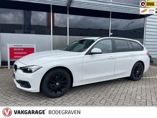 BMW 3-serie Touring 318i High Executive / leder / stoelverwarming