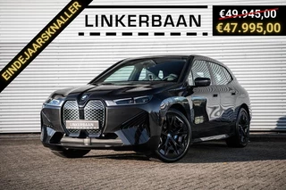 Hoofdafbeelding BMW iX BMW iX xDrive40 High Executive 77 kWh | Sportpakket | Panodak Skylounge | 22 inch | NL auto |