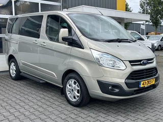 Hoofdafbeelding Ford Transit Custom Ford Transit Custom 8-persoons 300 2.2 TDCI 155 PK L1H1 Titanium BTW vrij Leder Camera PDC Stoelverwarming Navigatie Cruise control Airco EURO 5 Kombi Combi Passenger Tourer Groepsvervoer Personenbus Taxi