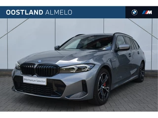 BMW 3 Serie Touring 330e High Executive M Sport Automaat / Panoramadak / Achteruitrijcamera / Sportstoelen / Stoelverwarming / LED / Live Cockpit Professional / Comfort Access