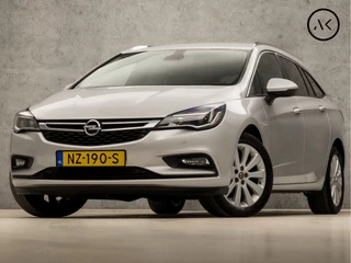 Hoofdafbeelding Opel Astra Opel Astra Sports Tourer 1.0 Sport (APPLE CARPLAY, GROOT NAVI, GETINT GLAS, TREKHAAK, PARKEERSENSOREN, SPORTSTOELEN, CRUISE, LM VELGEN, NIEUWE APK, NIEUWSTAAT)