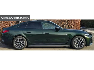 BMW i4 eDrive35 High Executive 70 kWh M Sport | Harman Kardon | Panoramadak | Stuurverwarming | Stoelverwarming | Head-Up Display | Adaptive Cruise Control | Keyless | Memory Seats | Laser Lights | Trekhaak | 360 Camera