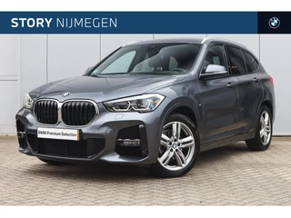 Hoofdafbeelding BMW X1 BMW X1 sDrive18i High Executive M Sport Automaat / Sportstoelen / Achteruitrijcamera / Head-Up / Comfort Access / Stoelverwarming