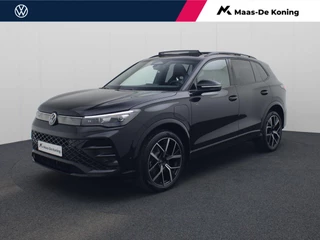 Hoofdafbeelding Volkswagen Tiguan Volkswagen Tiguan 1.5 eHybrid 272PK DSG R-Line Black Style · Panoramadak · Elek. Trekhaak · Apple/Android · Camera · Massage · Alarm · 20'' Inch · Garantie t/m 10-06-2030 of 100.000km.