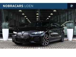 BMW i4 eDrive35 Gran Coupé M Sport / Schuif-kanteldak / Adaptieve LED / Achteruitrijcamera / Stoelverwarming / Parking Assistant / Live Cockpit Plus