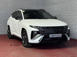 Hoofdafbeelding Hyundai Tucson Hyundai Tucson NIEUWE AUTO 1.6 T-GDI PHEV 252PK 4WD N-LINE SKY PANO. 360.CAMERA ELEK.KLEP ELEK.STOEL/GEHEUG.VERWARMD SUBWFR 19''LMV ZWARTE HEMEL HEADUP STOELKOELING STUURVERW. PLUG IN HYBRIDE - 5 JAAR GARANTIE