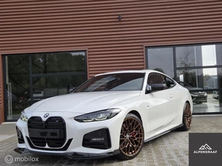 Hoofdafbeelding BMW 4 Serie BMW 4-serie Coupé 420i M-Sport | Schuifdak| Leer | Sfeerverlichting |Carplay|