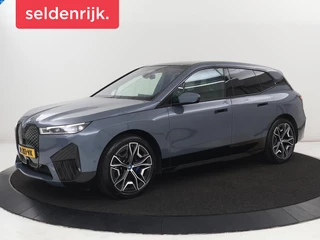 BMW iX xDrive40 High Executive 77 kWh | SOH 95,9% |  Panoramadak | Laserlicht | Harman/Kardon | 360 Camera | Trekhaak | Leder | Head-Up | 22'' | Stoelverwarming | Carplay | Side Assist | Navigatie