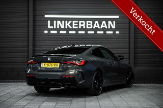 Hoofdafbeelding BMW 4 Serie BMW 4-serie Coupé M440i xDrive High Executive | Vol opties | Panodak | H&K | Head-Up | Laser | 19 inch | NL auto |
