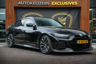 Hoofdafbeelding BMW i4 BMW i4 M50 High Executive 84 kWh Carbon Adapt. Cruise HeadUp Luxe Leder 20"LM Individual