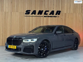 Hoofdafbeelding BMW 7 Serie BMW 7-serie 745e High Executive M-sport Carbon Core PANO|SOFT CLOSE|HUD|H&K|SHADOW|LASER|MASSAGE V&A|STOEL VENTILATIE
