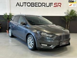 Hoofdafbeelding Ford Focus Ford Focus Wagon 1.0 Titanium Camera! Armsteun! Cruise Controle! Navigatie! Bomvol opties!