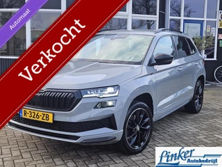 Skoda Karoq 1.5 TSI ACT Sportline Business DSG TREKH NL-AUTO ACHTERBANK VERWARMING