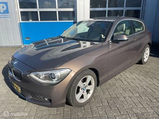 Hoofdafbeelding BMW 1 Serie BMW 1-serie 116i EDE High Exe. XENON NAVI BLUET PDC CRUISE