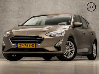 Ford Focus 1.0 EcoBoost Titanium Business Automaat (APPLE CARPLAY, GROOT NAVI, STUUR/STOELVERWARMING, ADAPTIVE CRUISE, SPORTSTOELEN, CLIMATE, TREKHAAK, GETINT GLAS, CAMERA, NIEUWE APK, NIEUWSTAAT)