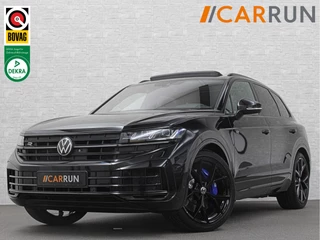Volkswagen Touareg R 3.0 TSI 462PK E-Hybrid | Luchtvering | Puglia-Leder | Panorama | DYN-Audio | Massage | Ventilatie | ACC | Trekhaak | Nachtzicht | Head-Up | Ergo-Comfort | 22" | Keyless-Entry | Memory | 4-Zone Clima | ISO-Glas | Stoelverwarming V+A | Dodehoek | Standkachel | Carplay | Draadloos Laden |