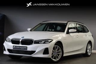 Hoofdafbeelding BMW 3 Serie BMW 3-serie Touring 320e Facelift SOH 98% Lederen Sportstoelen LED Koplampen Navi Live Cockpit Plus